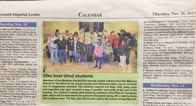 Newspaper clipping of photo and story regarded Meramc-Arnold Elks hosting MSB students for Haloween party